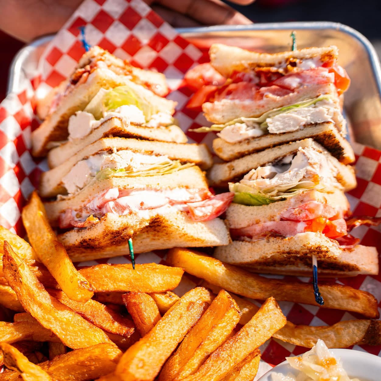 Fontenelle club sandwiches served with golden fries
